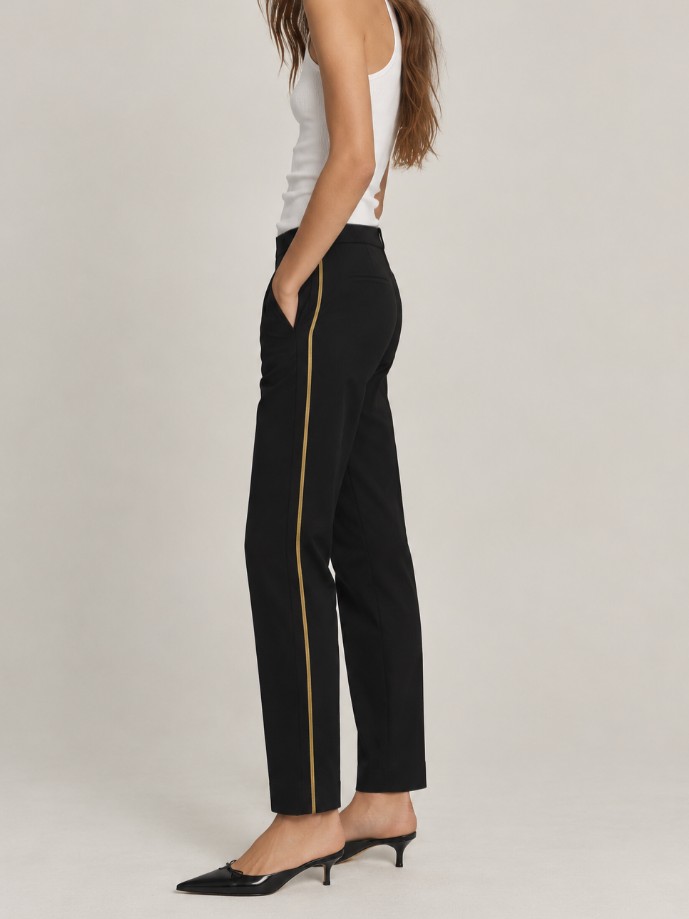 Calça preta skinny faixa dourada